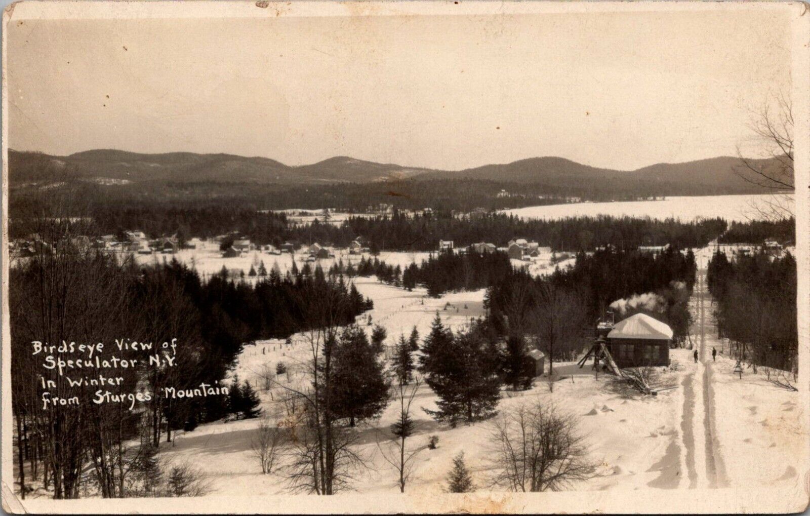 Postcard NY Speculator-New York Birdseye View in Winter from Sturges Mtn RPPC Bb