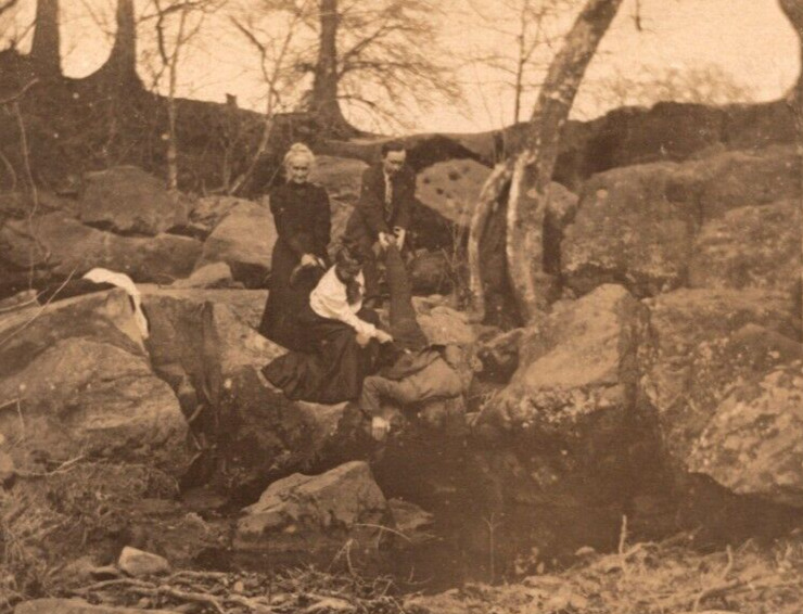 RPPC People Hold Man Up By His Legs While He Looks Under Rocks ANTIQUE Postcard