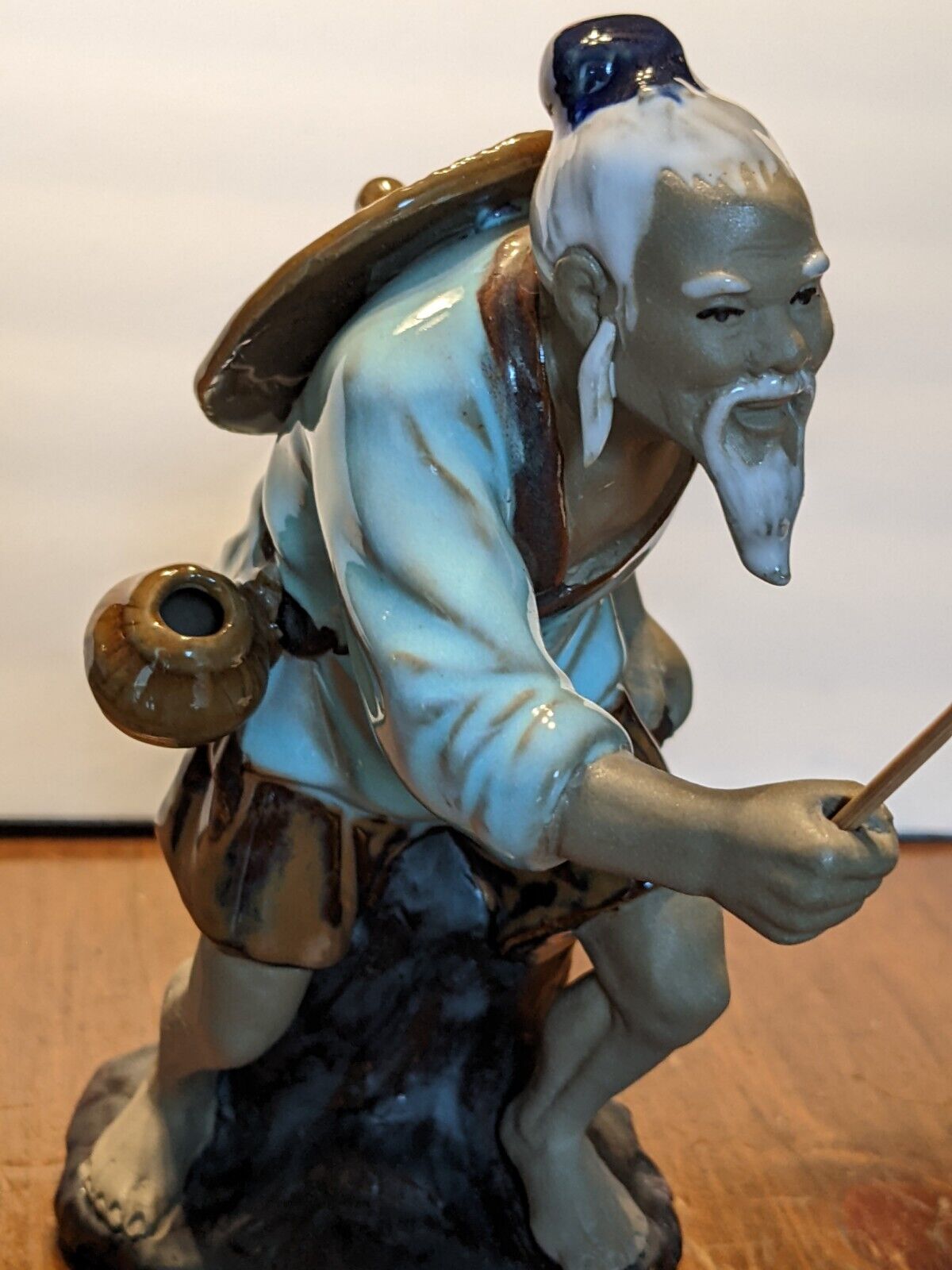 Vintage fishing man 100% New Crafted & Glazed.7 inches tall...never sold